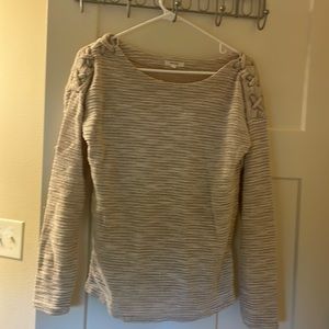 Tan Maurice’s brand sweater.